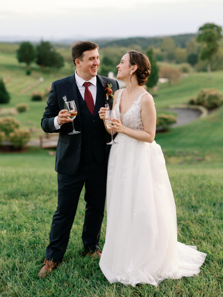 Bride and Groom share a toast during wedding at the Stone Tower Winery 